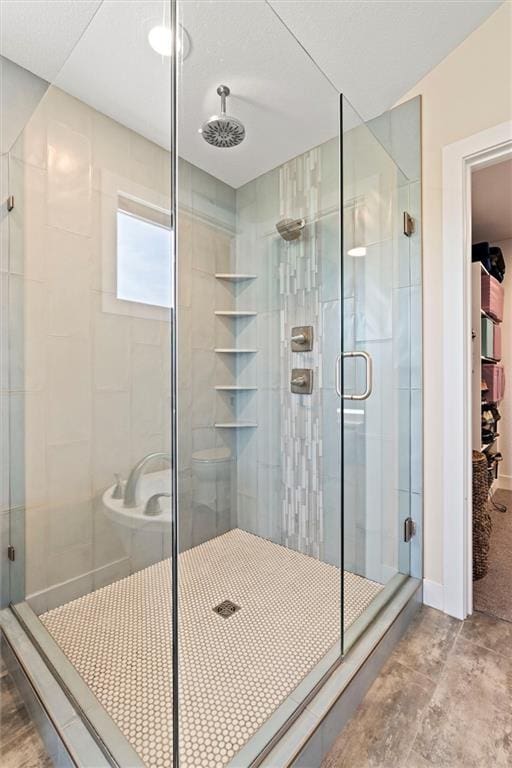 bathroom featuring a stall shower