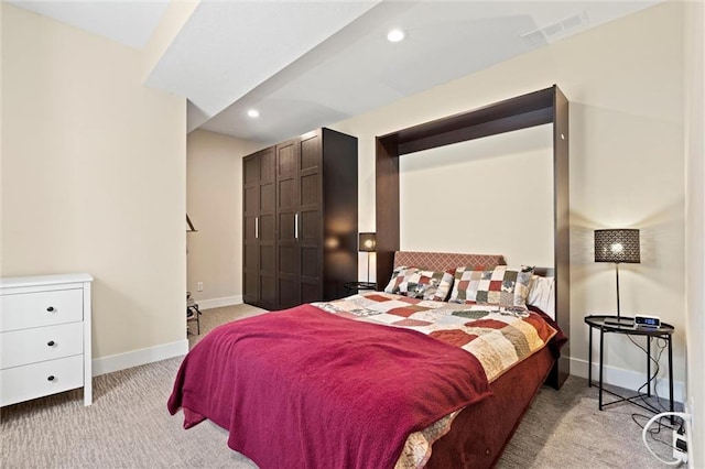 bedroom with baseboards, carpet, recessed lighting, and visible vents