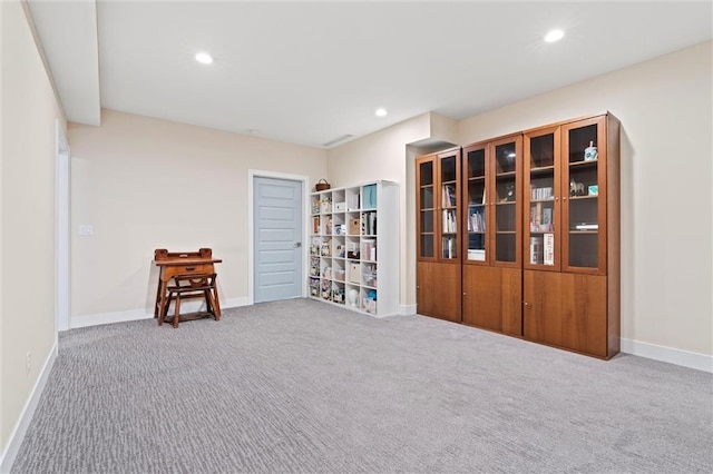 interior space with carpet flooring, recessed lighting, and baseboards