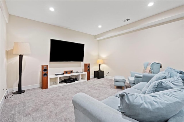 living area with recessed lighting, baseboards, visible vents, and carpet