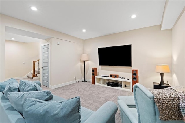 living area featuring light colored carpet, recessed lighting, stairs, and baseboards