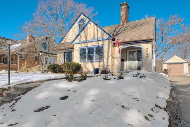 view of front of home featuring an outbuilding and a garage