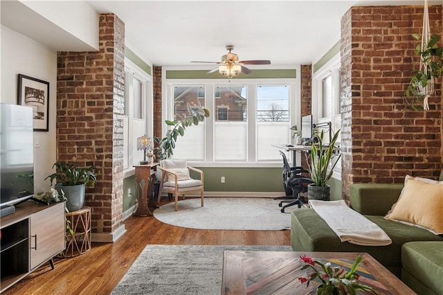 interior space featuring ceiling fan