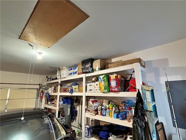 storage area with a garage and attic access