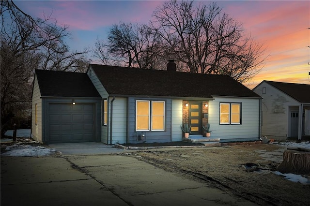 ranch-style house with a garage