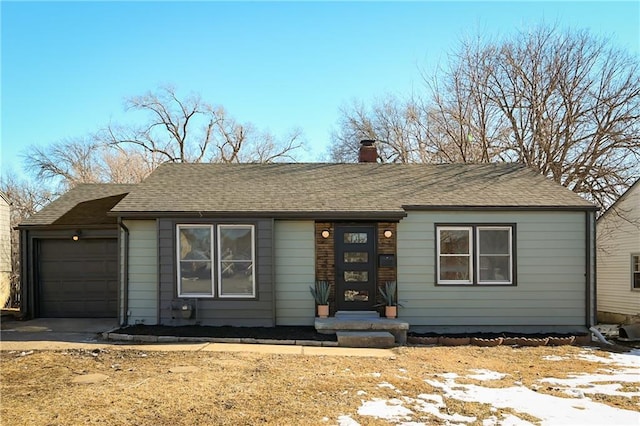 single story home with a garage