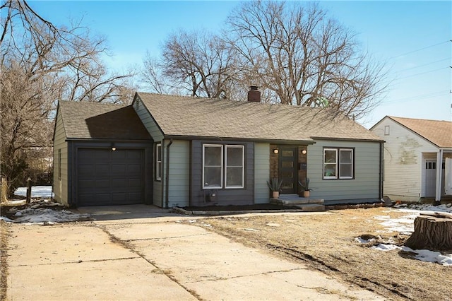 ranch-style house featuring a garage