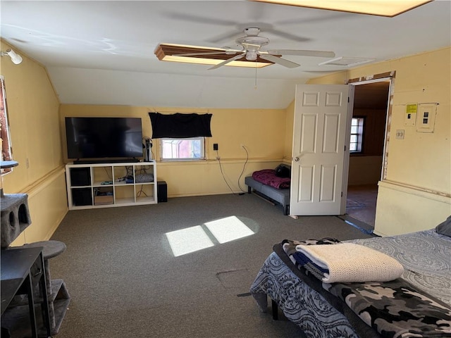 carpeted bedroom with lofted ceiling and ceiling fan