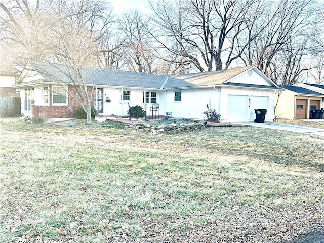 ranch-style house with a garage, a front yard, brick siding, and a chimney