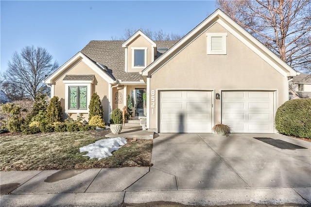 view of front of home with a garage