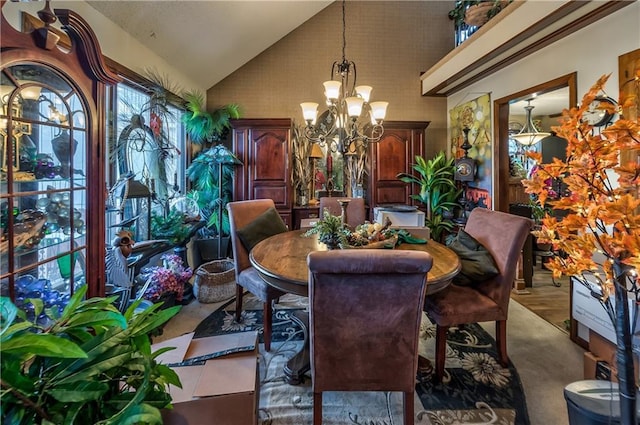 dining room featuring lofted ceiling and an inviting chandelier