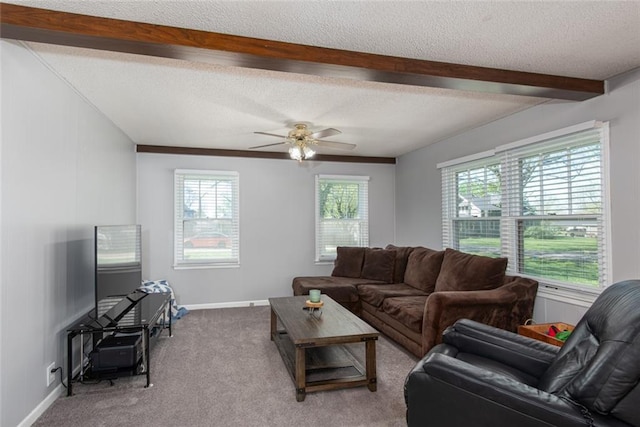 living room with ceiling fan, light carpet, and a textured ceiling