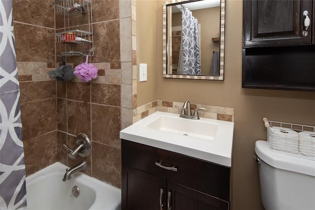 full bathroom with shower / bathtub combination with curtain, vanity, and toilet