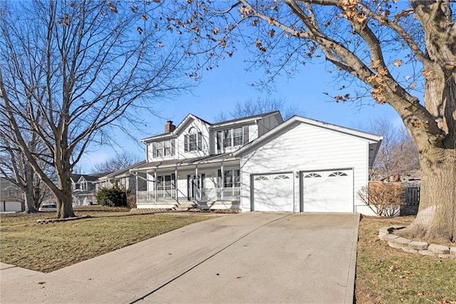 front of property featuring a porch, a garage, and a front yard