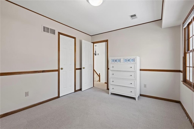 unfurnished bedroom with light carpet