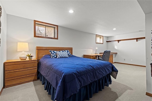 bedroom featuring light carpet