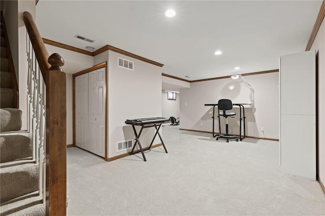 workout room with crown molding and light colored carpet