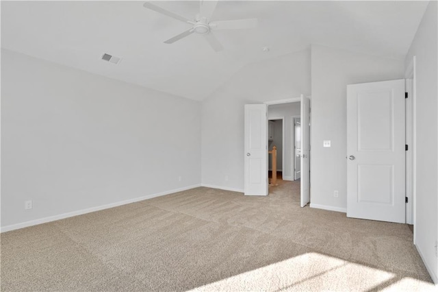 unfurnished bedroom with vaulted ceiling, light colored carpet, and ceiling fan