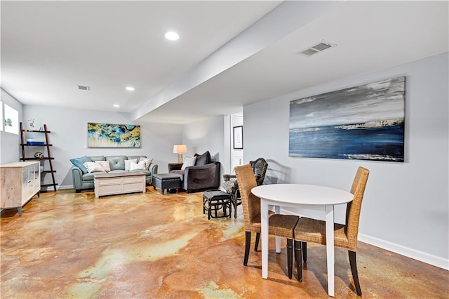 dining space featuring baseboards, visible vents, concrete flooring, and recessed lighting