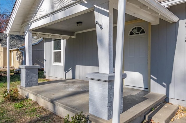 entrance to property with a balcony