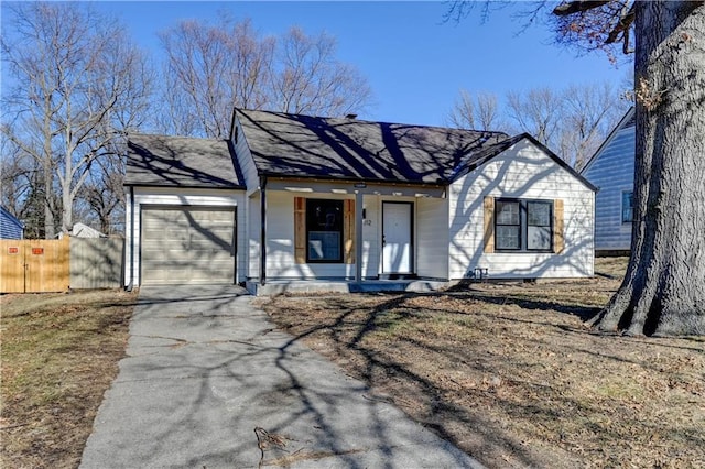 single story home with a garage and a porch