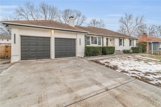 single story home with a garage