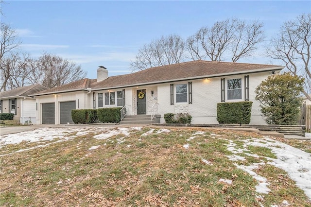 ranch-style home with a garage