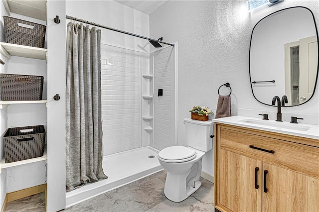 bathroom with vanity, toilet, and a shower with shower curtain