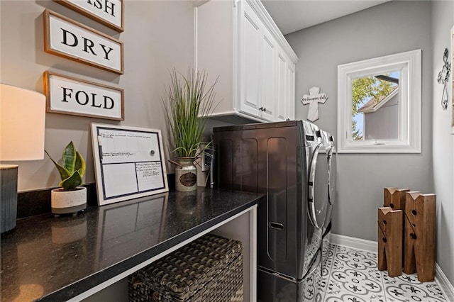 washroom with light tile patterned flooring, cabinets, and separate washer and dryer