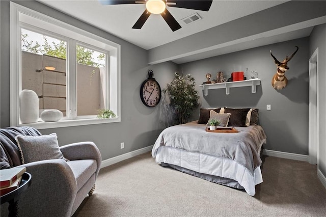 carpeted bedroom featuring ceiling fan