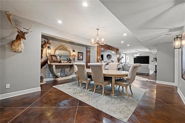 dining area featuring a chandelier