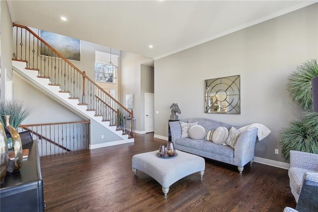 living area featuring stairway, recessed lighting, wood finished floors, and baseboards