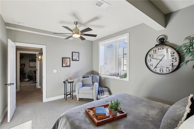 carpeted bedroom with ceiling fan, visible vents, and baseboards