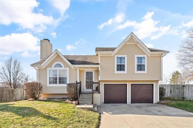 view of front facade featuring a garage and a front yard