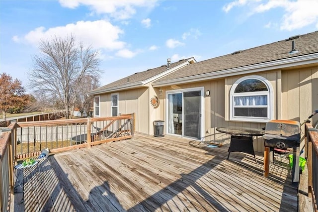 wooden terrace with area for grilling