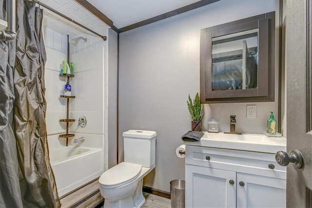 full bathroom featuring hardwood / wood-style flooring, vanity, toilet, and shower / bath combo with shower curtain