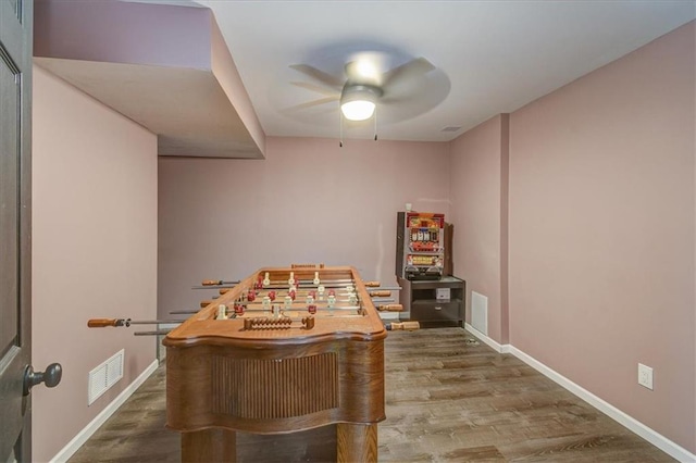 recreation room featuring hardwood / wood-style floors and ceiling fan