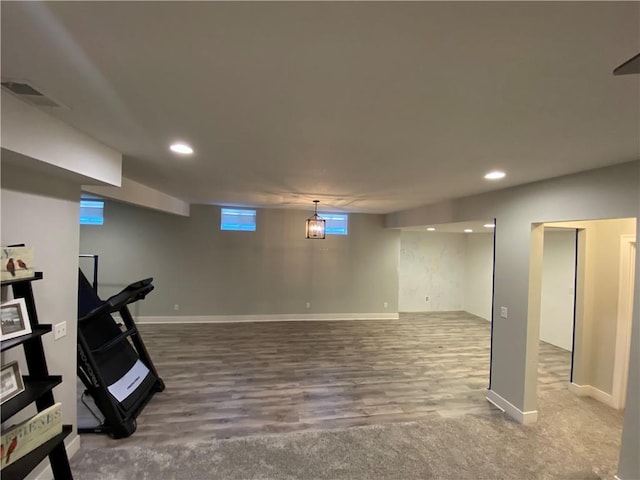 exercise area featuring hardwood / wood-style floors