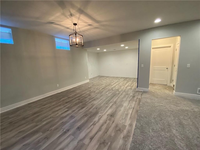 basement featuring hardwood / wood-style flooring