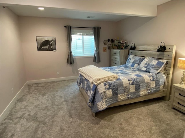 bedroom featuring light colored carpet