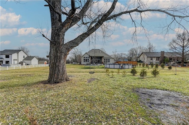 view of yard with a swimming pool