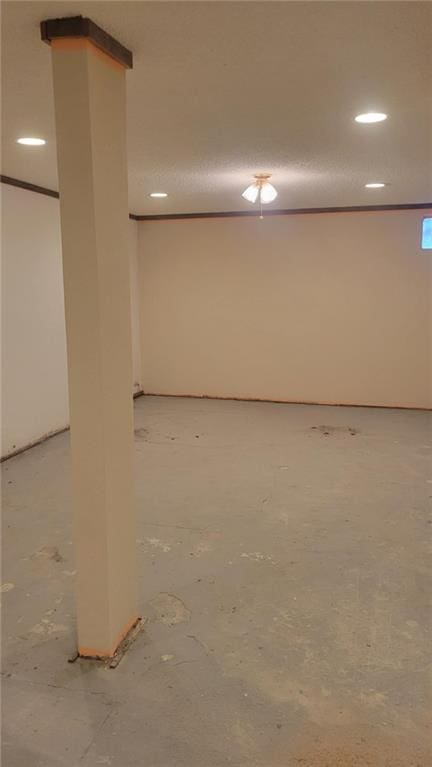 basement featuring crown molding