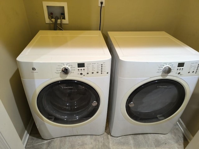 laundry area featuring separate washer and dryer