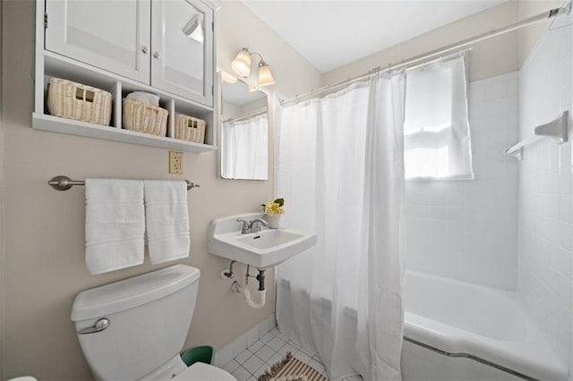 full bathroom with a sink, tile patterned flooring, toilet, and shower / bathtub combination with curtain