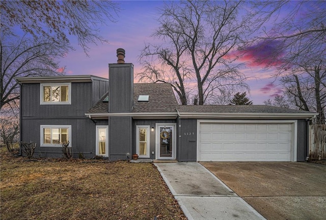 view of front of property with a garage