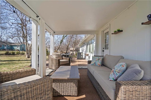 view of patio / terrace with an outdoor living space and covered porch