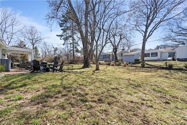 view of yard with central AC