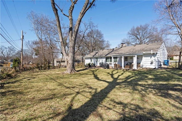 view of yard with a patio and fence