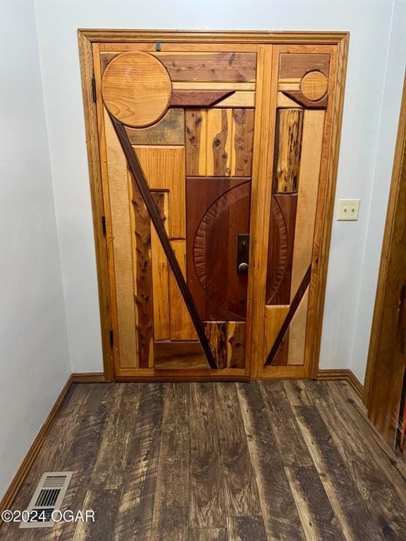 interior details featuring wood-type flooring