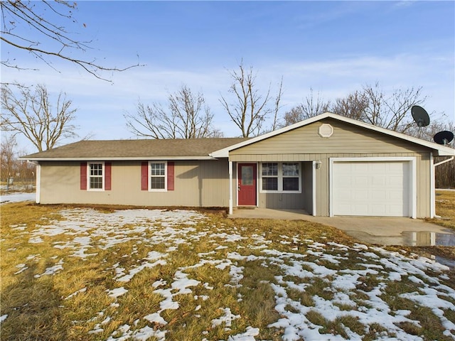 ranch-style house featuring a garage